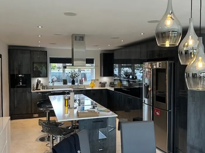 Feature pendant lighting above a kitchen breakfast bar