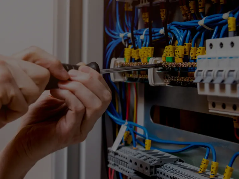 Electrician tracing a circuit fault inside a consumer unit