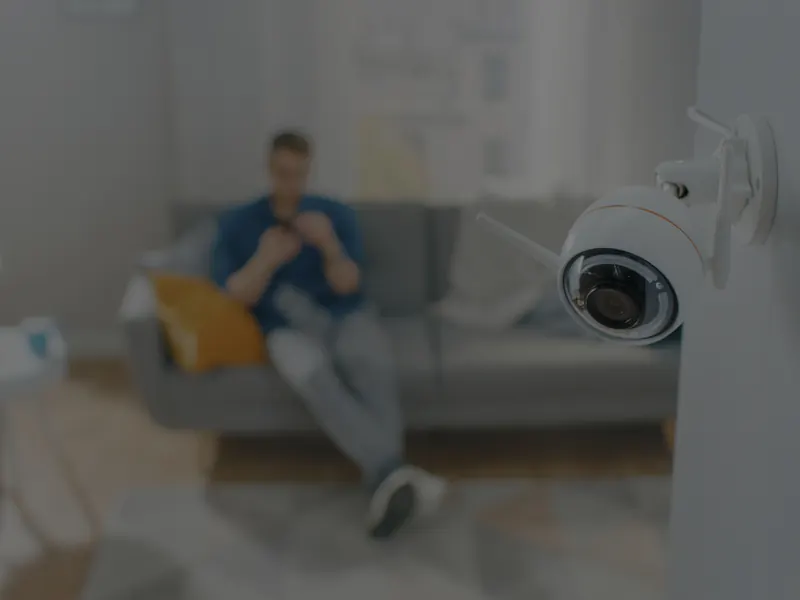 Indoor security camera installed in a home living room